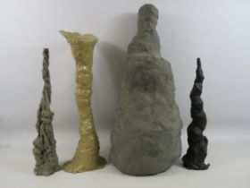 4 Large abstact clay sculptures, the tallest measures 21.5".