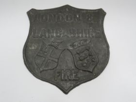 Vintage London and Lancashire fire lead shield shaped sign, 9" by 8".