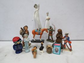 Mixed figurine lot to include Doggie people Robin hood and the trail of the painted ponies.