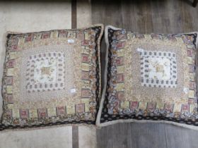 Two pretty cushions. Each approx 16 inches square. See photos. S2