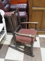 Small Edwardian era, Childs or Dolls rocking chair. In good order apart from worn seat. Would benefi