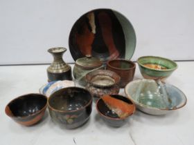 11 pieces of signed studio pottery.