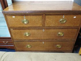 Oak Chest with brass handes. Raised on Bracket feet it measures approx H:35 x W:39 x D:19 inches.