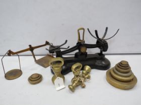 Cast iron scales and a selection of various weights.
