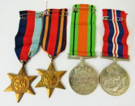 Quartet of WW2 Medals. 39-45 Star, Burma Star, Defence Medal plus 1939-1945 Medal, all with ribbons