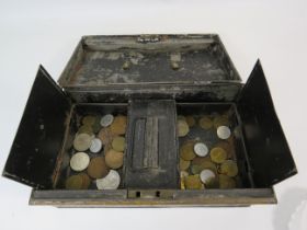 Vintage cash box and a selection of uk and foreign coins.