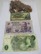 English pound note, 2 foreign banknotes and 300 grams of 1/2 pennies.
