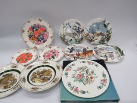 Selection of collectable plates by Royal Albert, Wedgwood and Aynsley.