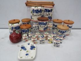 Large selection of Toni Raymond Storage jars and spice jars.