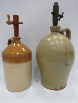 2 Large stoneware wine flagons with wooden taps, one with local interest for Hull.