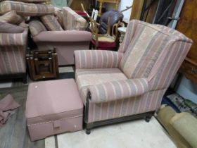 Good Quality upholstered armchair in excellent condition. Comes complete with lidded footstool. S