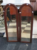 Two Slender oval topped bevel glass mirrors in dark oak frames. Each approx 31 x 10 inches. See ph