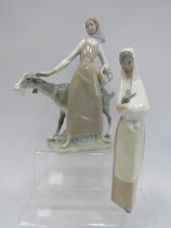 2 Lladro Nao Figurines, Girl with a rabbit & Girl with goat (goat missing an ear see pics) approx