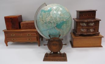 World globe and a selection of wooden jewellery and keepsake boxes.