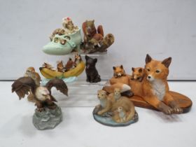 Selection of various porcelain animal figurines including a beatrix potter money box.