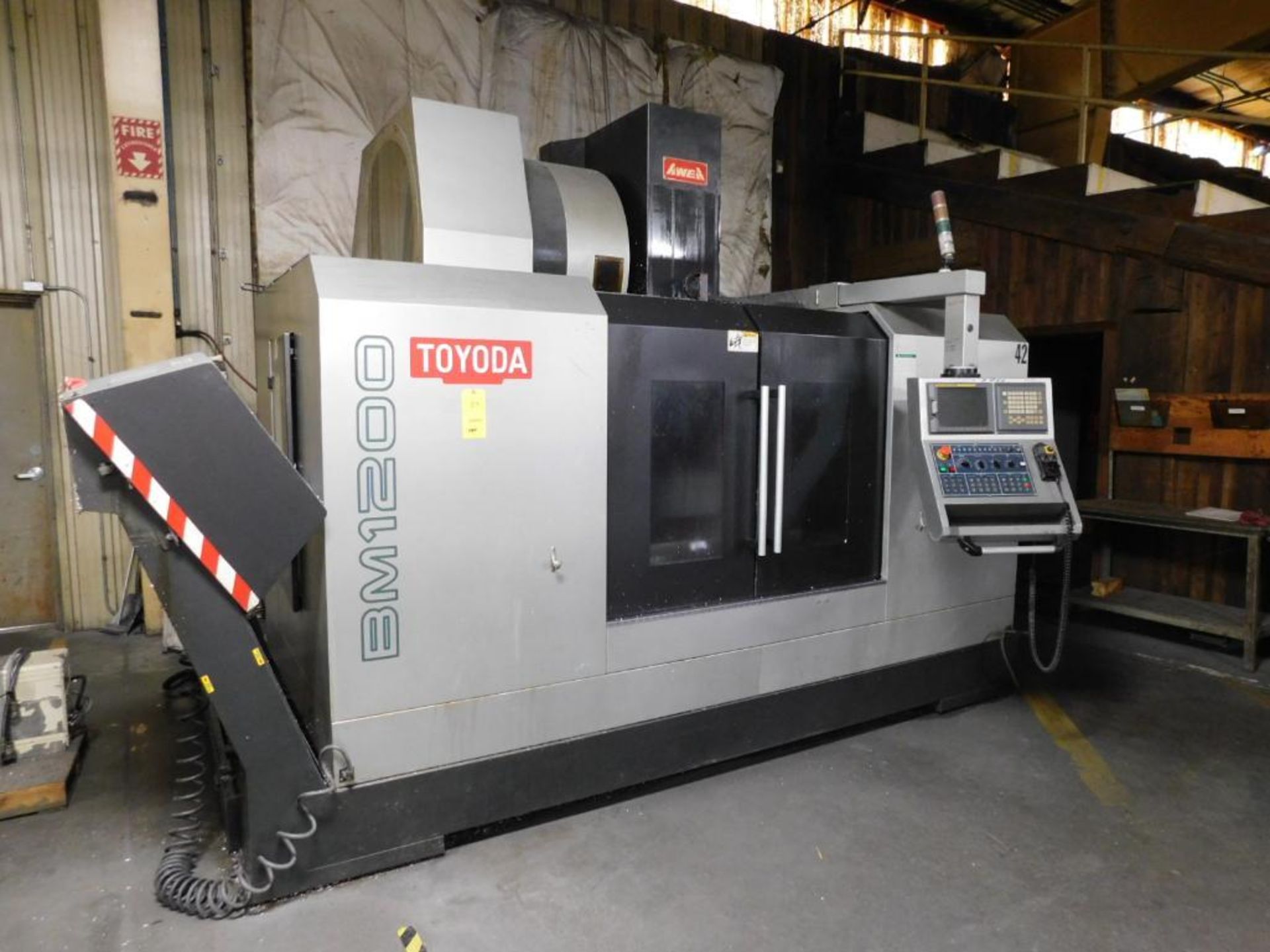 Toyoda AWEA BM1200 4-Axis VMC, Fanuc 18i-MB Control, 47.2" x 23.6" x 23.6" tr