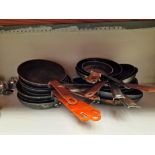 A Large Quantity Of Various Frying Pans And Skillets As Found