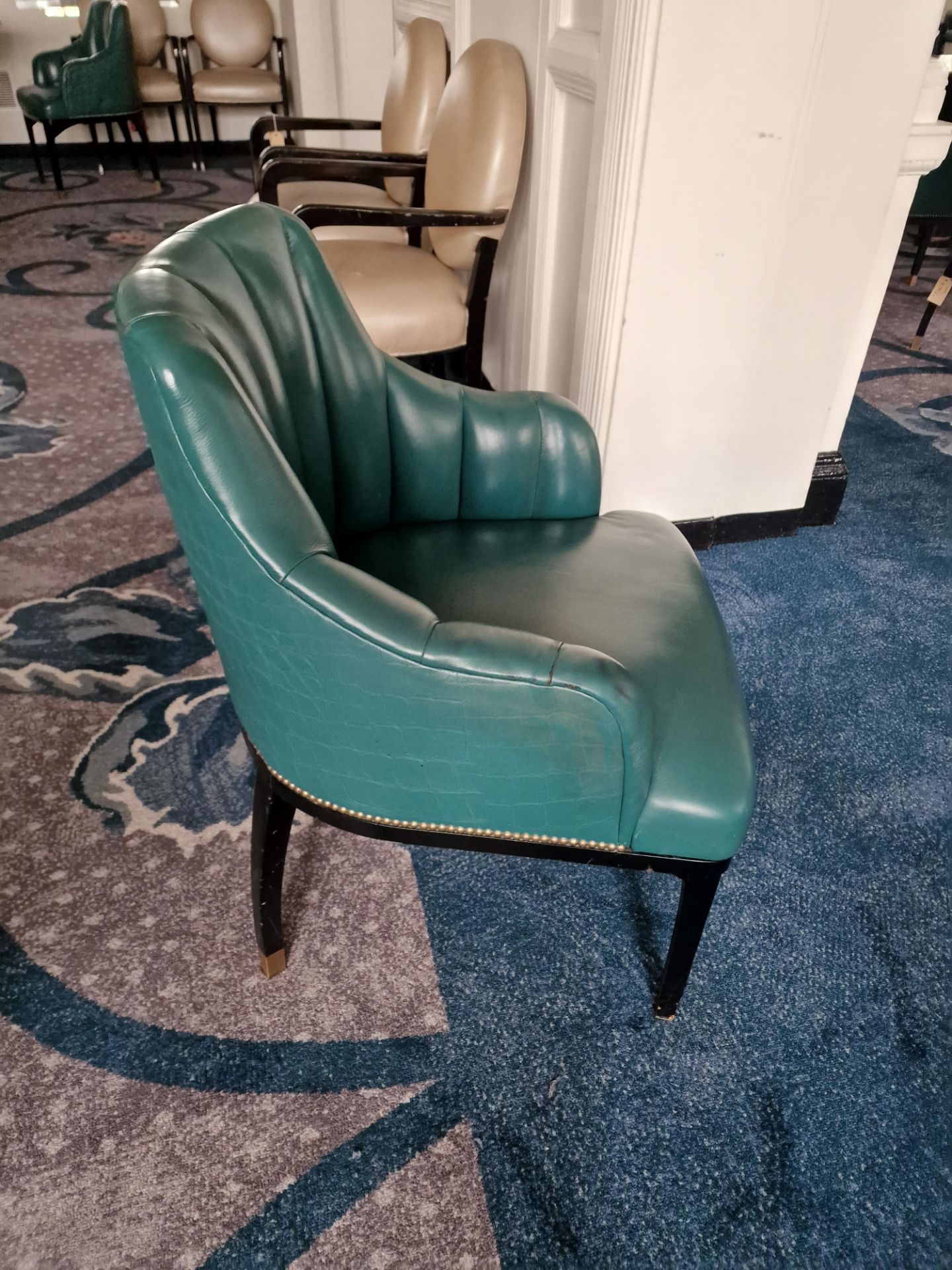 A pair of armchairs upholstered in green leather with a stud pin detailing the arm partially - Image 6 of 9