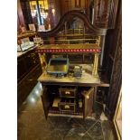 A bespoke Robert Angell marble top dumb waiter station two door three drawer timber unit in oiled