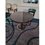 Circular dining table art deco style macassar ebony and palm veneer on solid timber frame mounted