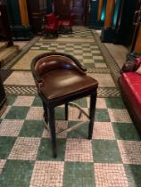 A Leather Club Bar Stool Upholstered in A Dark Tone Leather The Frame Stained Dark With A
