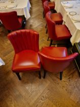 A pair of bespoke Robert Angell dining chair Featuring a classic armless design, red leather