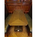 A bespoke Robert Angell Churchill rectangular dining table the oak top mounted above a shaped square