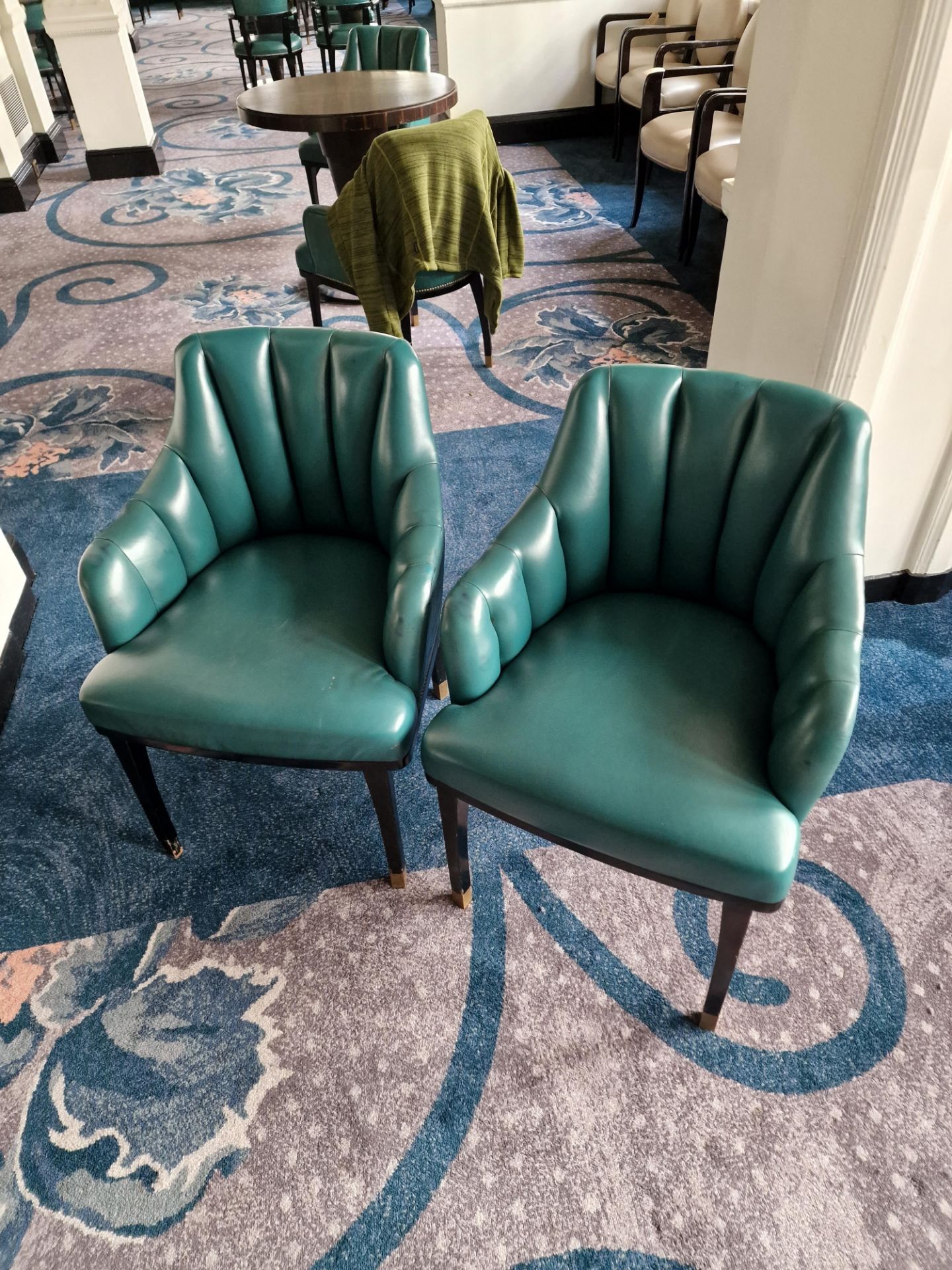 A pair of armchairs upholstered in green leather with a stud pin detailing the arm partially - Image 3 of 9