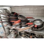 A Large Quantity Of Various Cast Frying Pans And Skillets