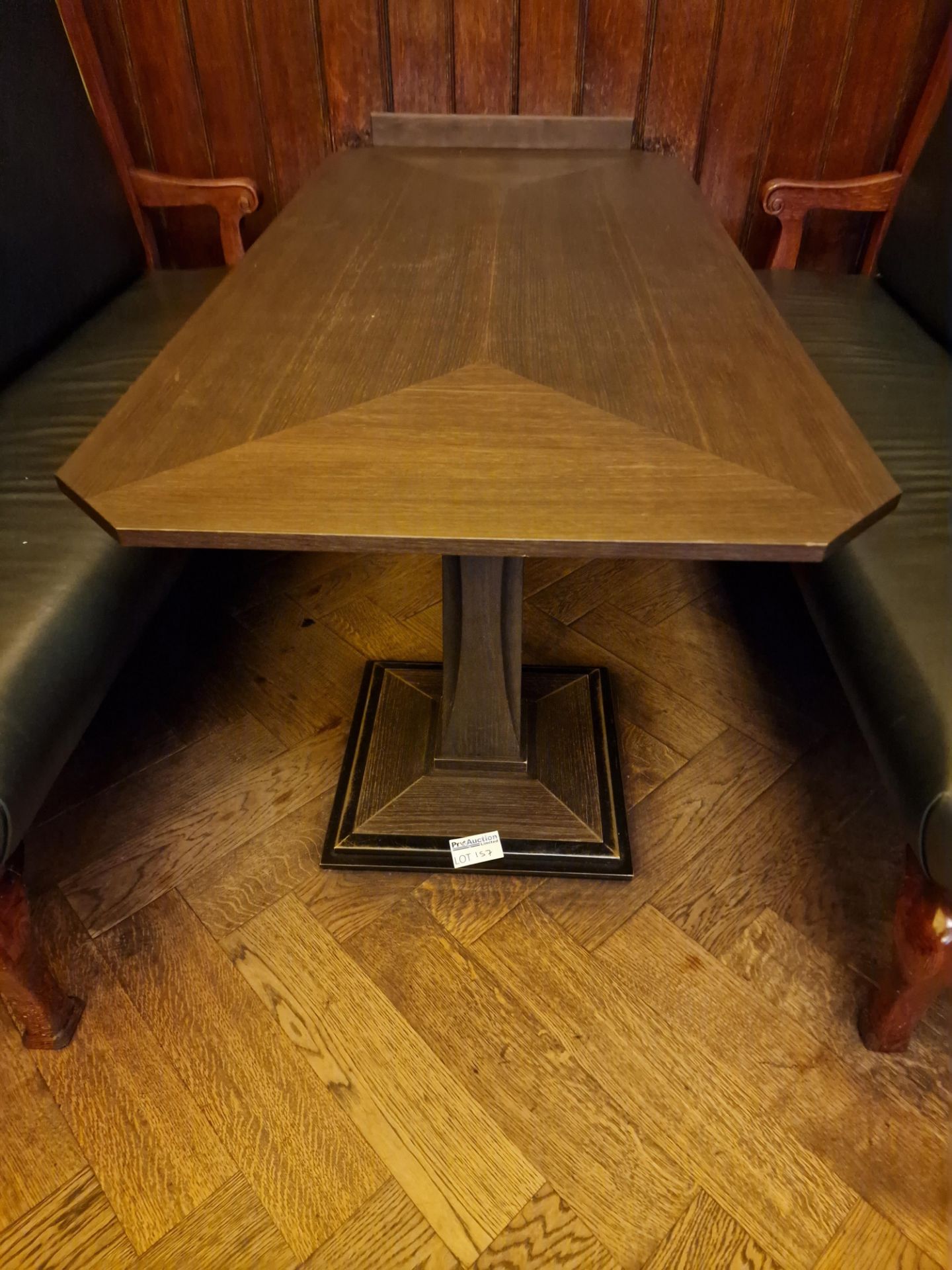 A bespoke Robert Angell Churchill rectangular dining table the oak top mounted above a shaped square