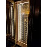 Brass and antique mirror wall mounted wine rack display a brass frame and glazed door for