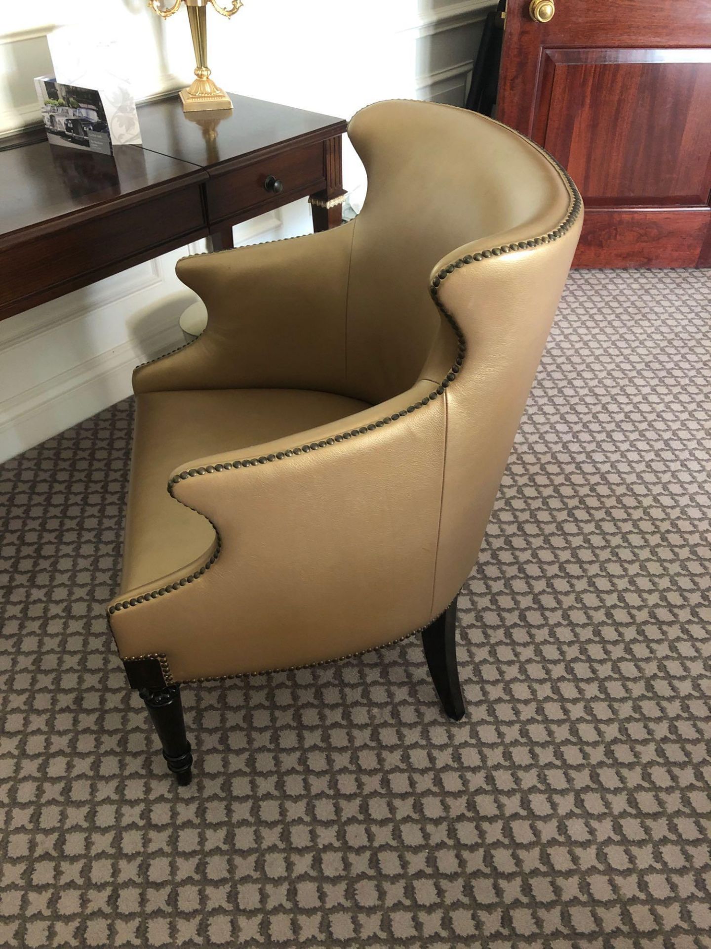 A Modern Wing Back Chair Upholstered In Gold Leather With Pin Stud Detail On Dark Solid Wood Frame - Image 2 of 2