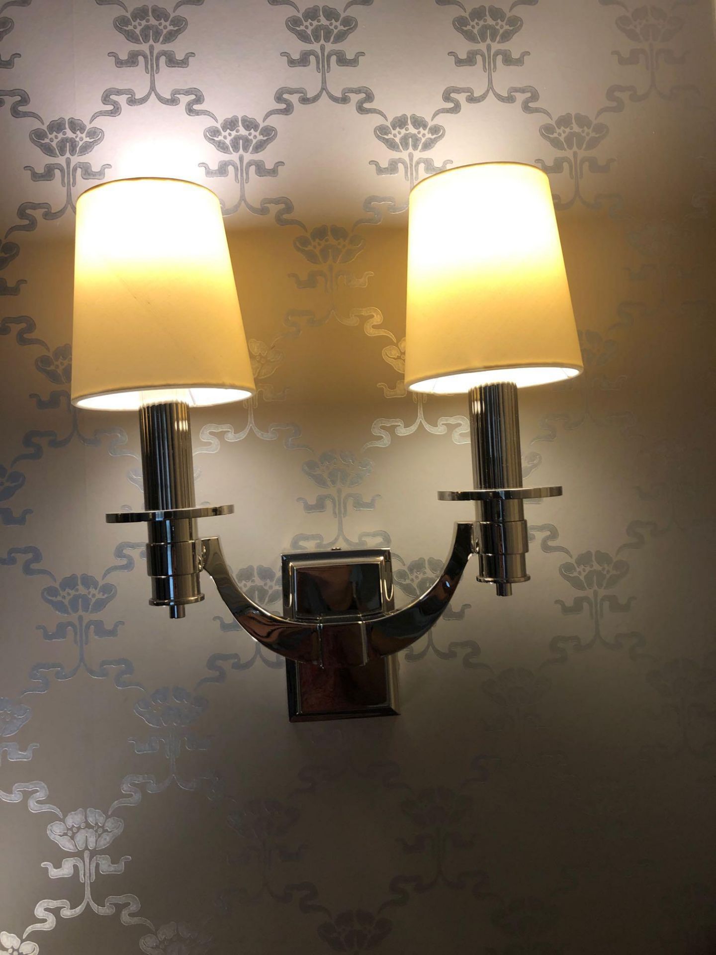 A Pair Of Contemporary Twin Arm Silver Coloured Polished Wall Sconces 51cm (Room 510)