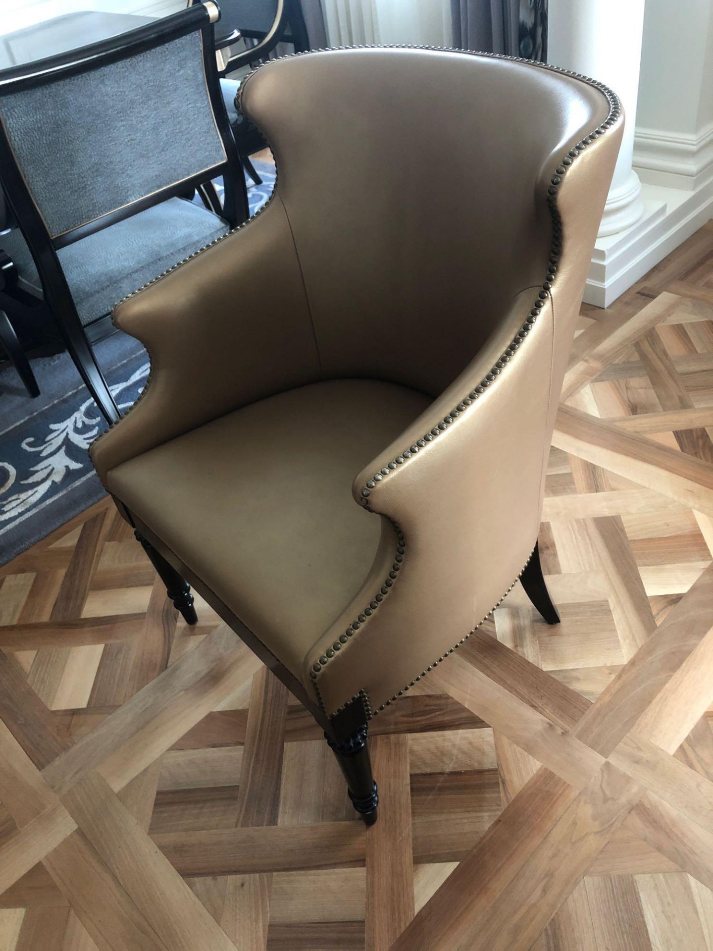 A Modern Wing Back Chair Upholstered In Gold Leather With Pin Stud Detail On Dark Solid Wood Frame - Image 2 of 2