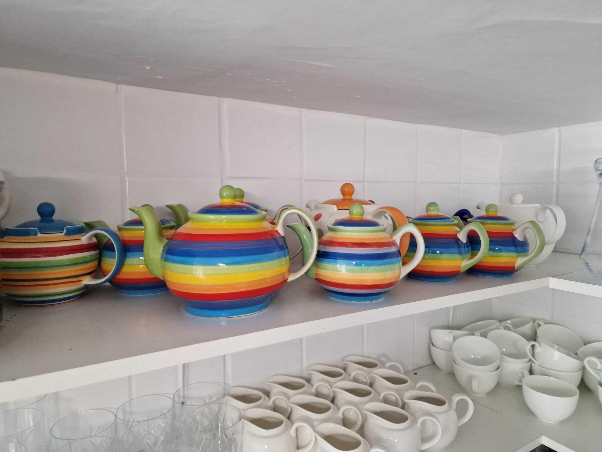 Various Traditional And Hand Painted Teapots As Found