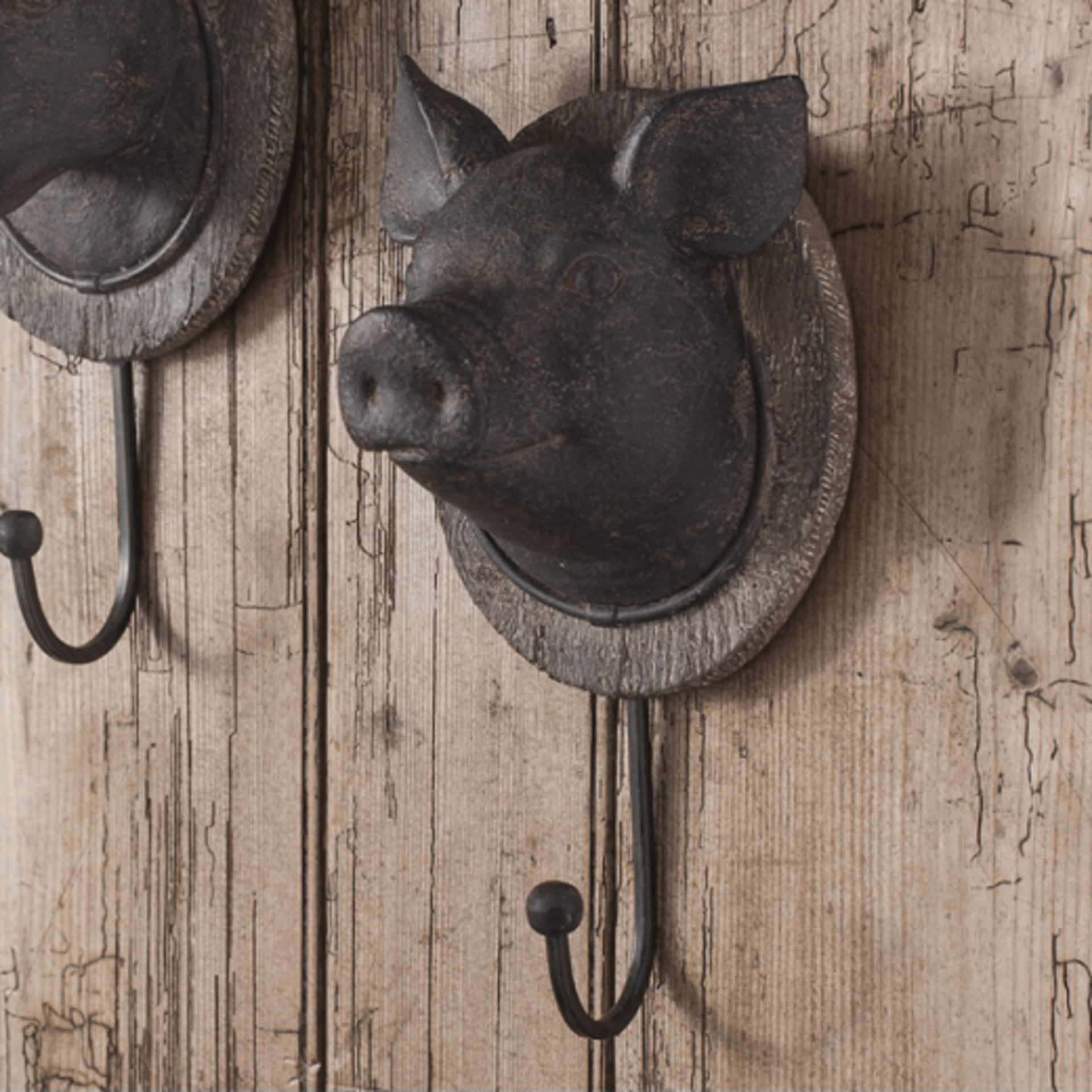 2 x Unique farmyard wall hooks in an aged bronze finish 125 x 110 x 245mm