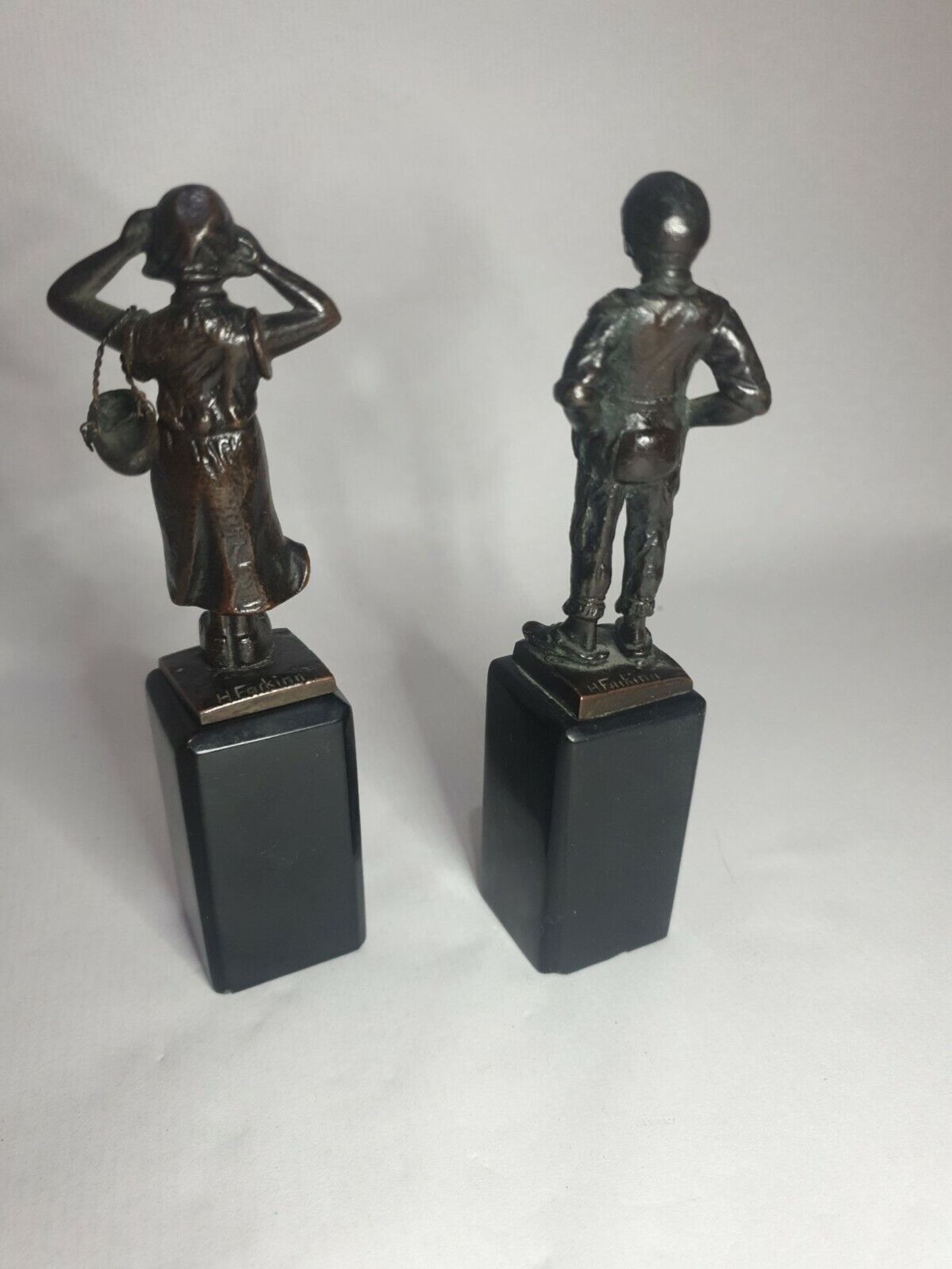 Two early 20th century bronze statuettes of a Dutch boy and girl, German signed to base H. - Image 2 of 5
