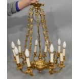 French Chandelier Highly Ornate Detail With Gold Gilt Over Bronze In The Louis XVI Style.