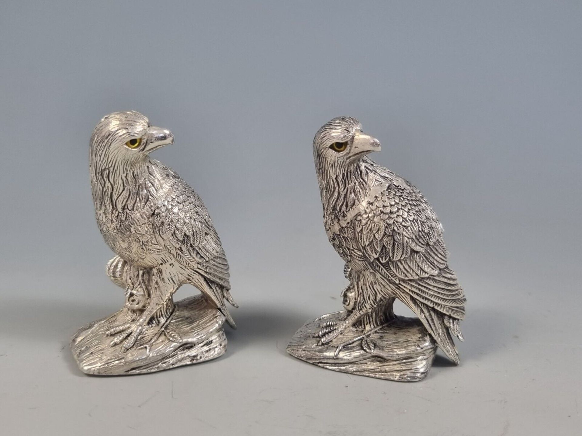 A beautiful pair of continental 800 silver salt and pepper condiments in the form of eagles