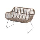 Toba Rattan Bench Contemporary crafted rattan bench with contrasting iron leg detail. This product