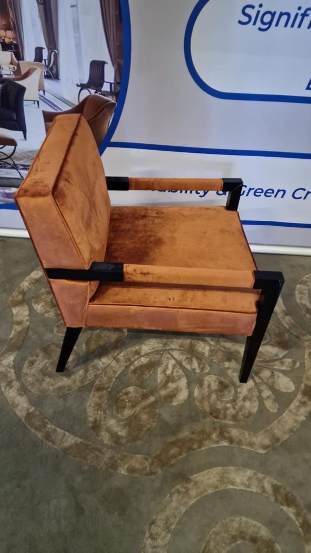 Copper upholstered arm chair with padded arms on a dark wooden frame with tapering legs 60 x 70 x - Image 2 of 3