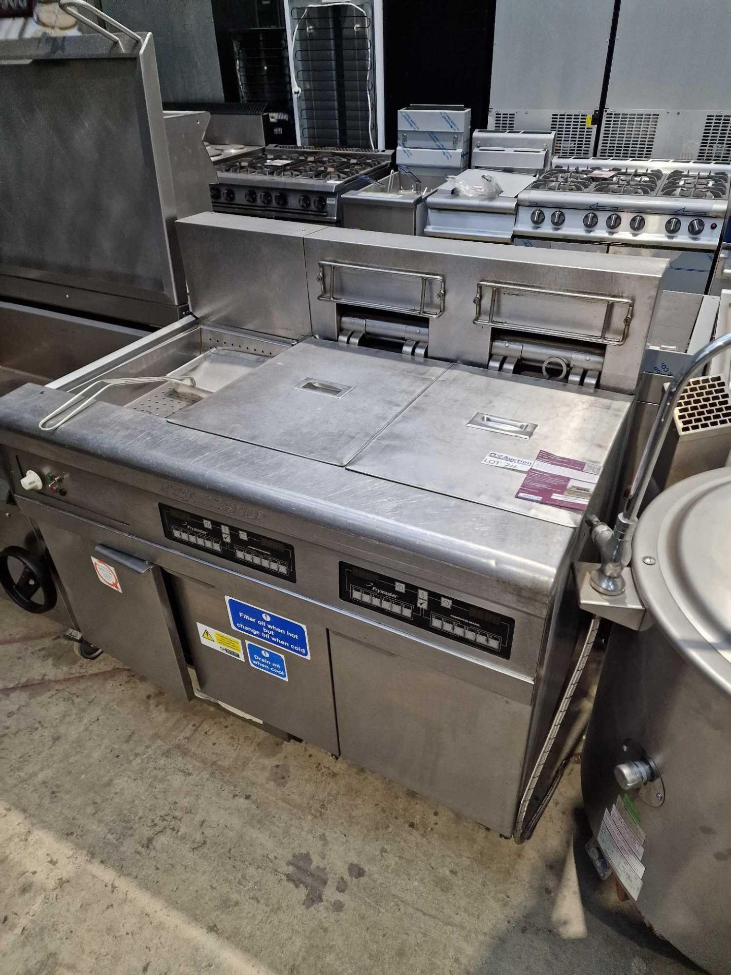 Frymaster Electric Twin fryer with chip scuttleFilterQuickâ€™s closed cabinet AF puts caring for the