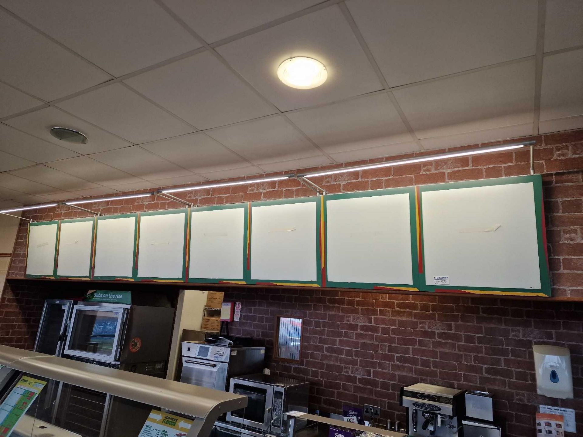 8 Station illuminated wall mounted menu display boards spans overall 5000 x 620mm