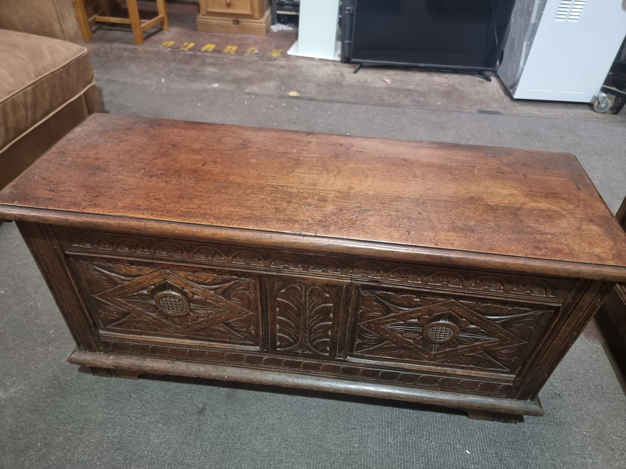 Late 18th Century style oak coffer the plank top above three geometrically carved panels on the - Image 10 of 17