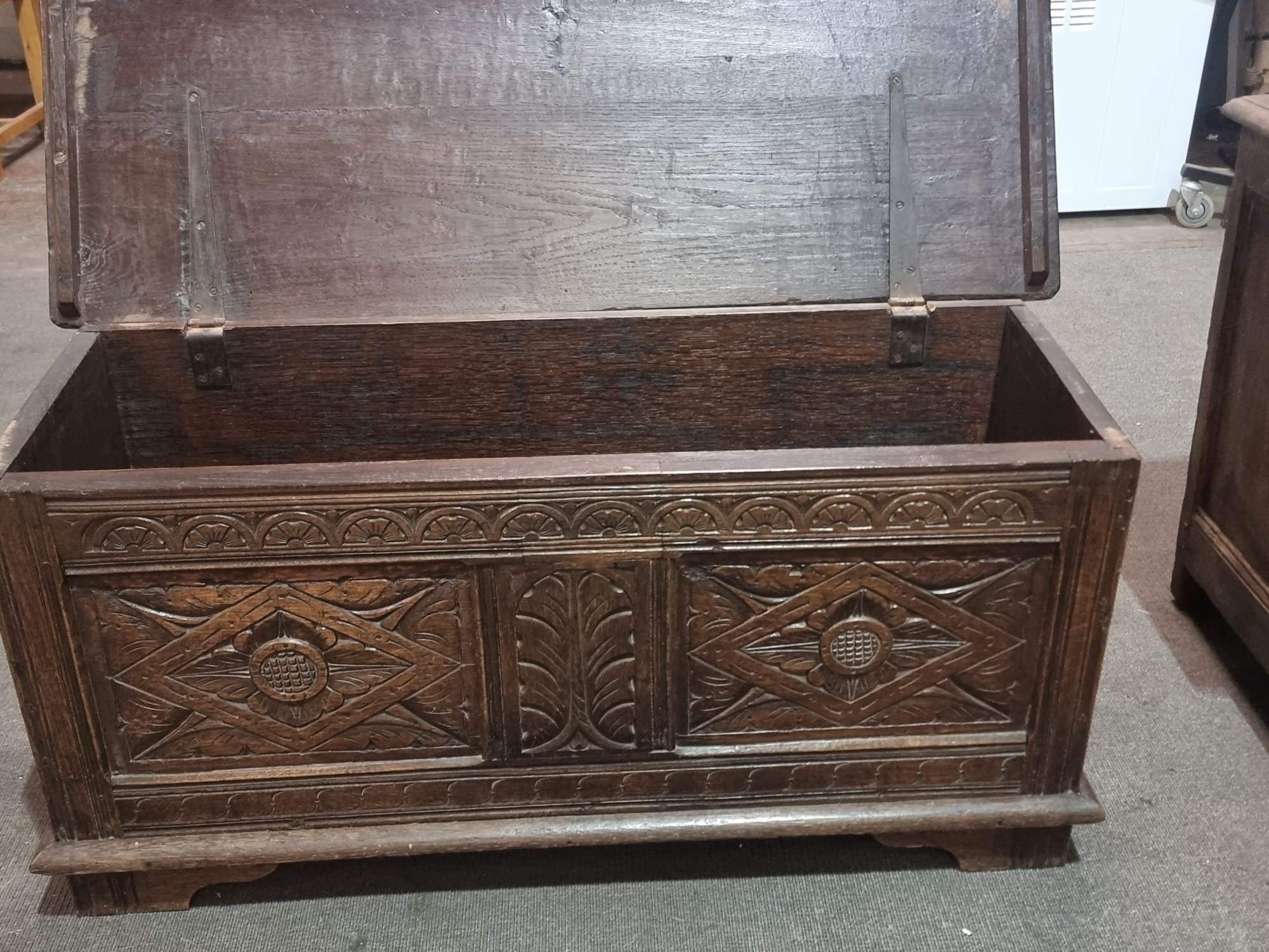 Late 18th Century style oak coffer the plank top above three geometrically carved panels on the - Image 3 of 17