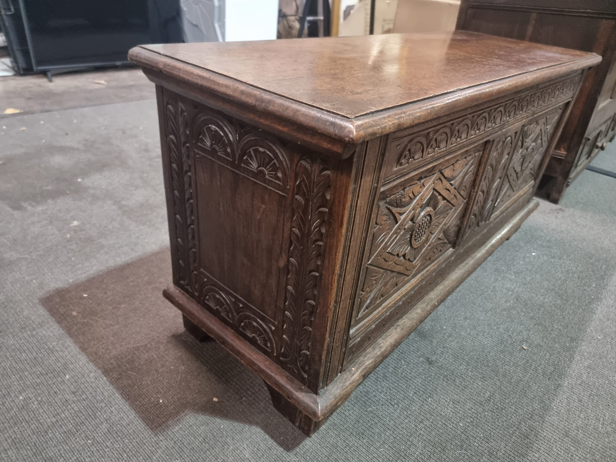 Late 18th Century style oak coffer the plank top above three geometrically carved panels on the - Image 14 of 17