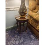 Circular Side Table Macassar Ebony With Glass Plate Top And Brass Trim Mounted On Tapering Legs With