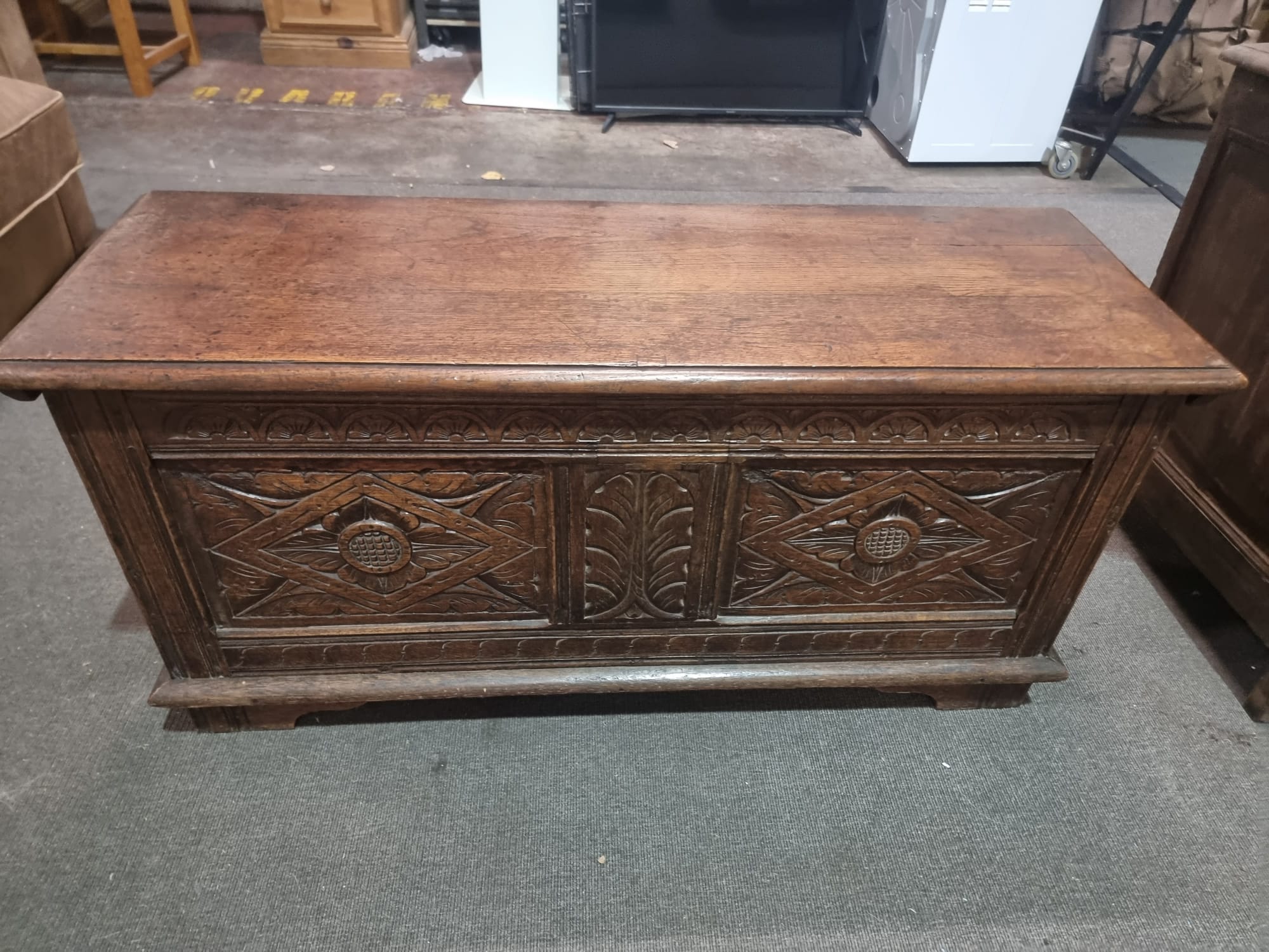 Late 18th Century style oak coffer the plank top above three geometrically carved panels on the - Image 15 of 17