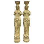 A Pair of Greek style caryatid columns, square top with gadroon underbelly, the semi-nude female