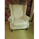 Upholstered Wingback Chair This traditionally styled wing chair has polyester fibre seat cushion and